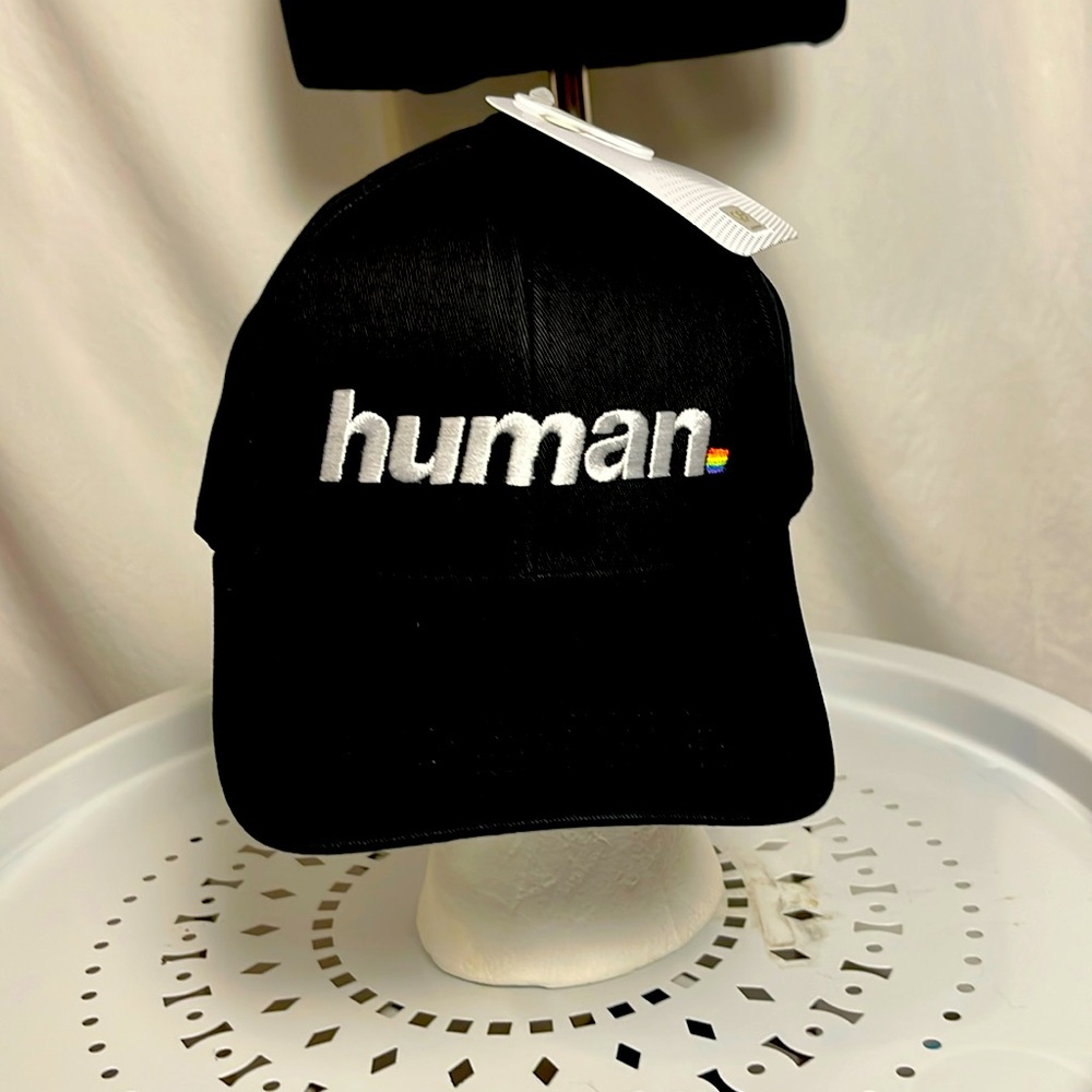 NWT NIP Queer Eye “HUMAN”embroidered baseball cap with adjustable able back.